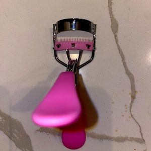Curling and combing eyelash curler